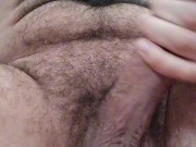 Hairy man jerking his big dick and balls until he cums with hot moanings. 9/16
