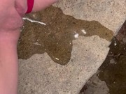 Girl pulls panties to the side to piss on steps 13/16