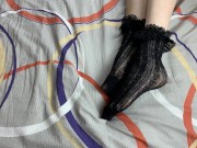 Caressing long legs of girl in black lace socks 9/16