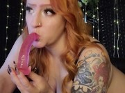 Redhead swallows a toy cock and vibrates her clit 14/16