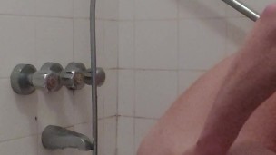 Skinny twink powerwashing his ass with shower head preparing for deep anal