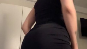 brunette in a short black dress