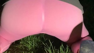 Girl Pisses her yoga pants on all fours from behind