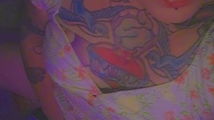 Tattooed Goth girl with pierced pussy