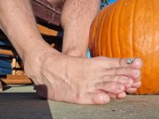 Showing off my pedicured feet next to my pumpkin
