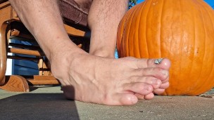 Showing off my pedicured feet next to my pumpkin