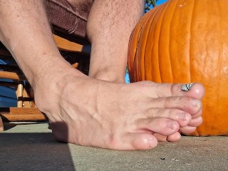 Showing off my pedicured feet next to my pumpkin
