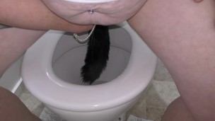 Trashy Kiwi MILF retrieves and reinserts Butt Plug tail after it falls out while pissing in toilet