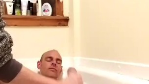Wanking daddy's 9 inch massive dick while he baths