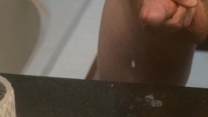 slow motion cumshot on bathroom counter