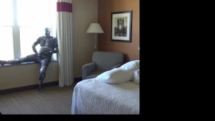 wetsuit and zentai at hotel window