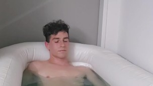 Boy take a bath and play with his dick