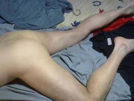 Frotting my vibrator on the bed continued