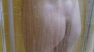 My step sister wanted me to film her taking a shower and masturbating in the hotel room