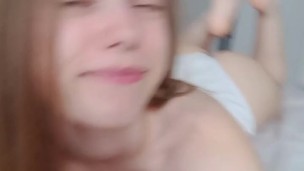 A student makes a sexy video with her boobs