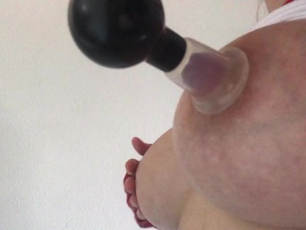 Submissive Harley Quinn pumps her nipples and milks her tits for Daddy