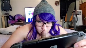Free use slut loves keeping a cock warm in her mouth playing video games.