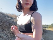 Petite cute and fit Asian girl on a hike in nature flexes her muscles and flashes her tits and pussy