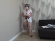 A mature BBW milf with big saggy natural tits gets dressed. 7/16