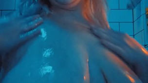 In the bathroom tub playing with bubbles and boobies