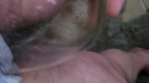 Pissing on a cold day in a glass