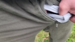 Pissing outdoors on a rainy day