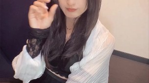 Individual video A video of a transvestite with long black hair quietly masturbating