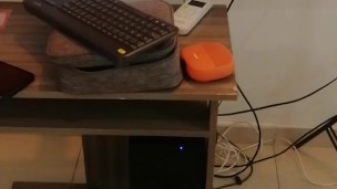 My girlfriend kneels down to suck my cock.