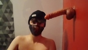 Handcuffed femboy suck a dildo with a chastity cage