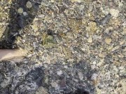 Playing with stones using toes