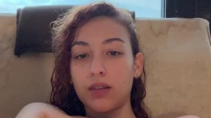 Chilling with naked boobs on sofa