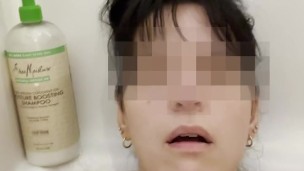 Girl masturbates in bathtub with her fingers and brings herself to orgasm