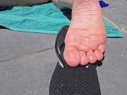 Sunbathing on balcony (feet soles angle only)