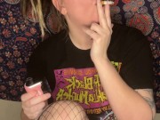 smoking a cigarette with black lipstick 10/16