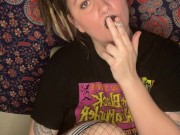 smoking a cigarette with black lipstick 12/16