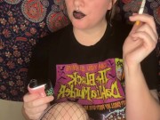 smoking a cigarette with black lipstick 9/16