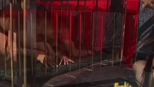 Mistress Natasha Sweet has fun with her caged slave