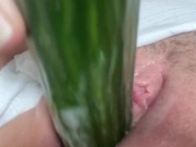 Stepmom with big pussy masturbates with cucumber