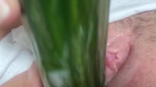 Stepmom with big pussy masturbates with cucumber