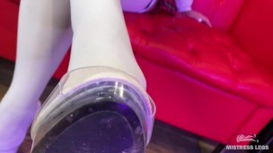 Mistress Legs in white nylon thigh-high stockings dangles shoe on her foot, foot fetish
