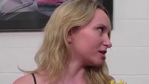 Slutty blonde dominatrix having fun playing with a slave's cock