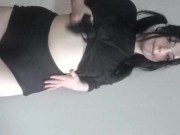 An aroused woman in a caress.