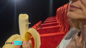 BLOWFLASH in the THEATER: a slutty milf can't resist to give a banana a blowjob