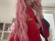 teen egirl cosplayer Zero Two playing with herself