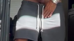 Using both hands to jerk my big white cowboy cock in public view