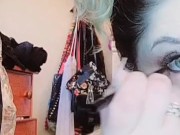 Sexy woman smoking at vanity