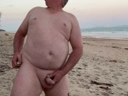 Naked, public beach wanking