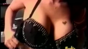 Two curvaceous lesbian sluts bang each other with a strap-on