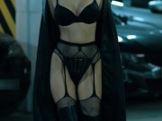 A model with an hourglass figure in long boots, stockings and black gloves seduces me in the parking 4/16