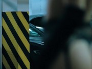 A model with an hourglass figure in long boots, stockings and black gloves seduces me in the parking 7/16